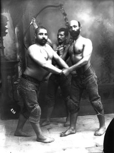 Studio Portrait of Three Traditional Persian Wrestlers